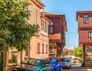 Fragment of the street, pavement and traditional buildings in the old town of Sozopol, Bulgaria.