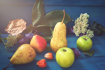 fresh ripe organic pears on a rustic wooden table