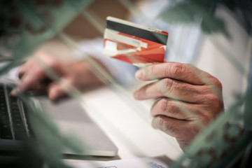 Using credit card. Close up.