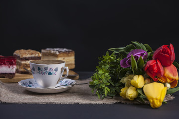 Tasty cake and flowers