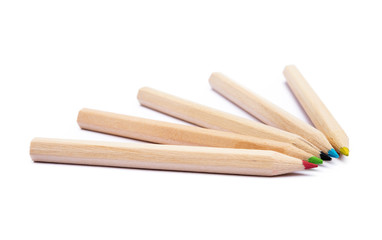 Wooden colorful ordinary pencils isolated on a white background 