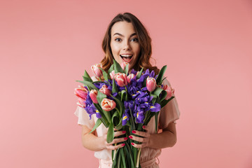 Portrait of an excited young girl in dress