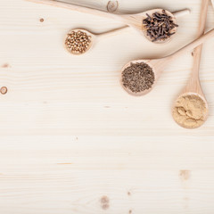 spices and herbs on kitchen wooden table background with copy space for text. food, cooking and restaurant concept. flat lay composition, top view