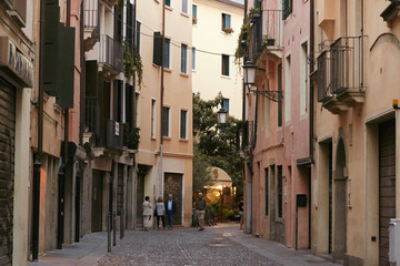 Fototapeta na wymiar Padova, Italy - August 24, 2017: street in a center of Padova, Italy