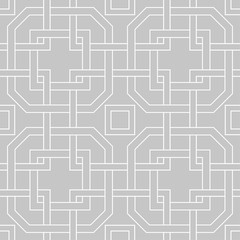 Gray and white geometric ornament. Seamless pattern
