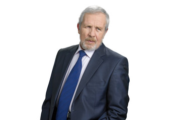 Earnest serious old business man. Successful smart man looks gravely. White isolated background.