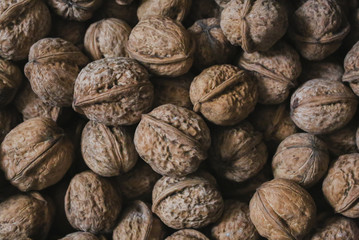 Walnuts background. Nuts texture. Healthy energy vegan food. Superfood for hipster lifestyle.