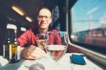 Young man traveling by train