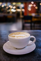 Coffee Milk and Foam with Bokeh Background
