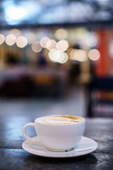 Coffee Milk and Foam with Bokeh Background