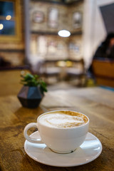 Coffee Milk and Foam with Bokeh Background