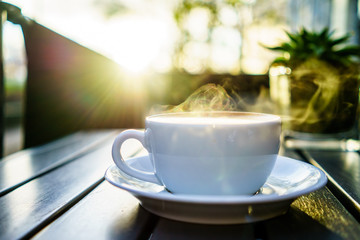 Caffe Latte with wooden background