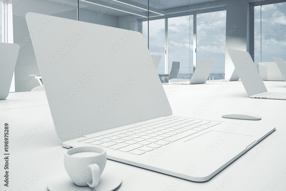 Poster side view of empty white laptop on table