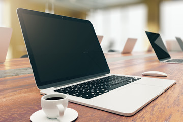 Side view of empty laptop on desktop