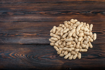 peanuts on wood background