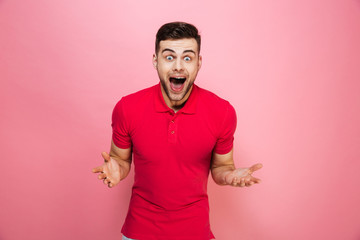 Portrait of a surprised young man looking at camera