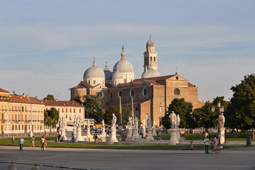 Fototapeta na wymiar Padova, Italy - August 24, 2017: The Basilica of Santa Giustina is located in the center of the Prato della Valle square.