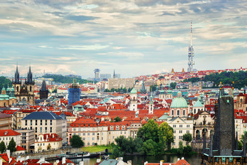 Fototapeta na wymiar Panoramic view of the evening city of Prague and the Vltava River. Czech Republic.