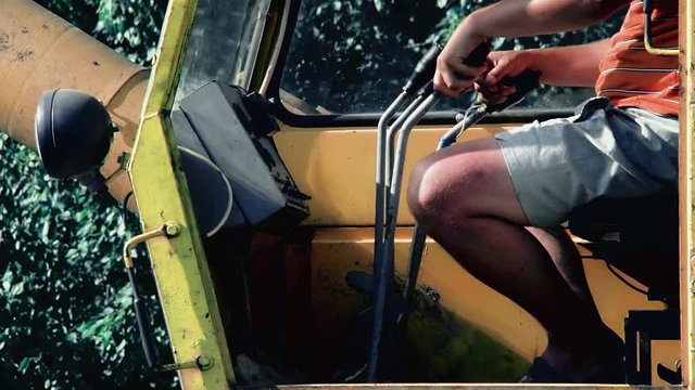 Russian man operating in the crane 