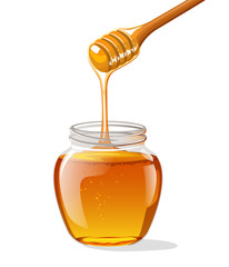 Glass jar of honey with wooden spoon 