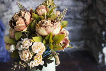 Bright bouquet of different colors. All the pores of the year. Artificial flowers