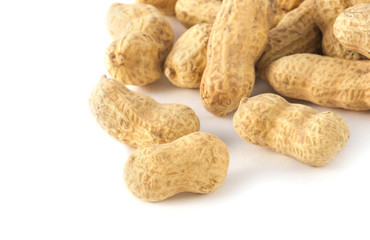 Nuts in shell and peeled isolated on white background.