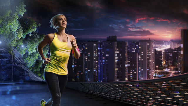 Woman Running Outdoors On The Night Town