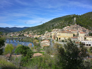 Fototapeta na wymiar The village of Roquebrun sitting on the river Orb in the Haut Languedoc, France