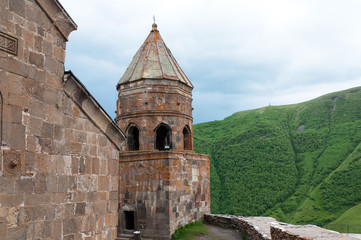 Fototapeta na wymiar Holy Trinity Church, Tsminda Sameba Church over Stepantsminda village near mount Kazbegi in Georgia.