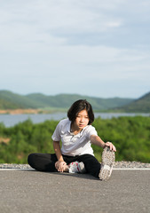 Woman preparing for jogging outdoor