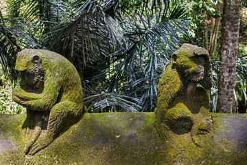 Stone monkey statue in Ubud Monkey Forest, Bali island, Indonesia