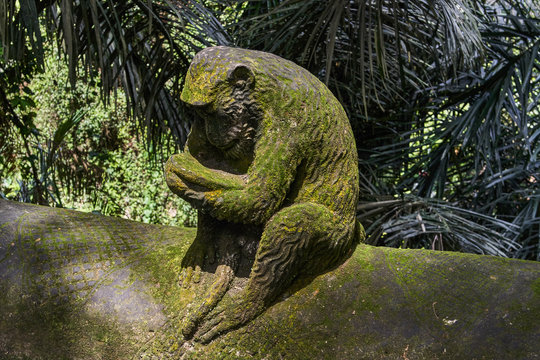 Stone monkey statue in Ubud Monkey Forest, Bali island, Indonesia