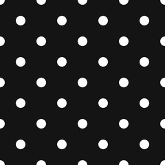 Handy and stylish dotted background. Handdrawn black and white polka dots texture.