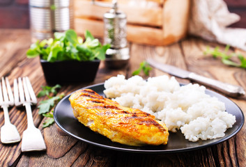 boiled rice with fried chicken breast