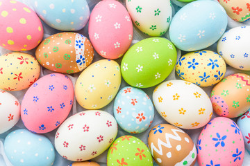 Happy easter!  Closeup Colorful Easter eggs background. Happy family preparing for Easter.