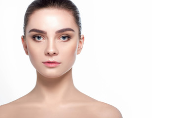 Fototapeta premium Beautiful woman face with fresh makeup, beauty healthy skin and wide eyebrows.