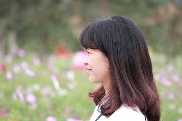 woman at the flower garden in Hanoi, Vietnam