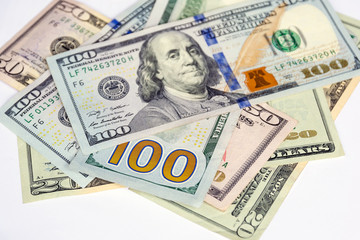 Group of Dollars bill 100,50, and 20 Dollars on white background, concepts for business and finance.