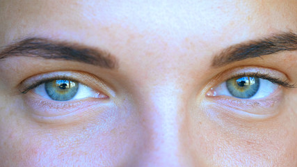 Beautiful green eyes, young woman.
