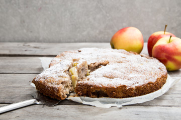 apple pie with whole-grain flour on a wooden background. concept of healthy eating