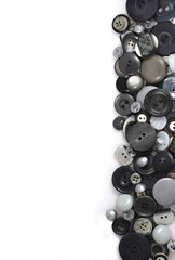 Multicolored accessories for sewing, bright threads, buttons and cloth