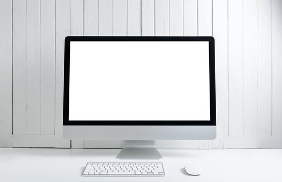 workplace background with Blank white screen modern desktop computer.