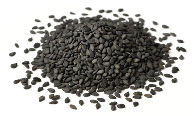 dried black sesame seeds isolated on white