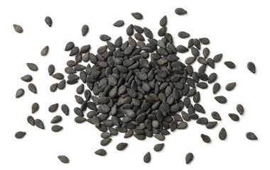 closeup of dried black sesame seeds isolated on white, top view
