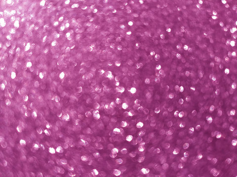 bright glittering pink purple blurred sparkling abstract background