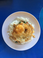 Spicy fried chicken with basil leaves