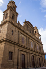 Fototapeta na wymiar Santiago de los Caballeros church angle perspective in Galdar town, Gran Canaria. Famous religious landmark in Las Palmas province, Spain
