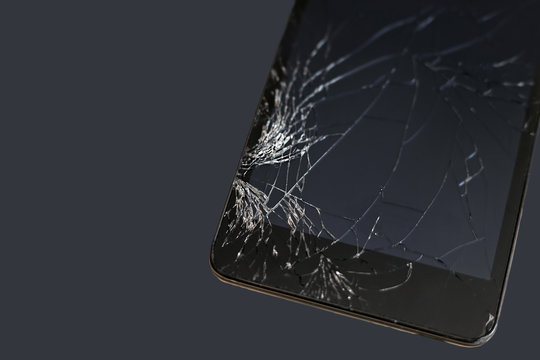 macro of broken glass on the smartphone
