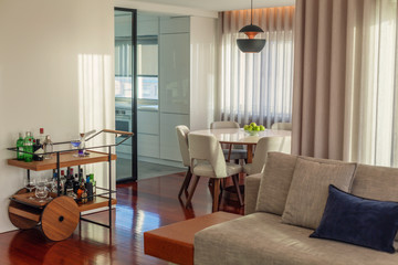 Modern kitchen, wine bar alcohol table in living room interior