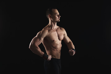 Fototapeta premium Strong athletic man showes naked muscular body